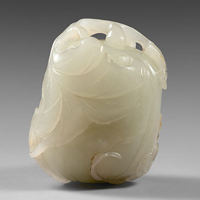 A pale celadon jade gourd figure - 1
