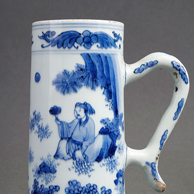 A porcelain tankard decorated with Taoists in a landscape - 1