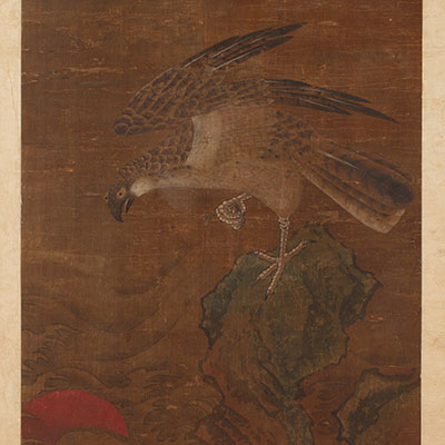 一幅描绘雄鹰栖息于岩石上的画作 - 1