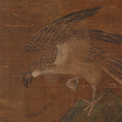 一幅描绘雄鹰栖息于岩石上的画作 - 2